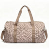 Neutral Zebra Quilted Duffle Bag
